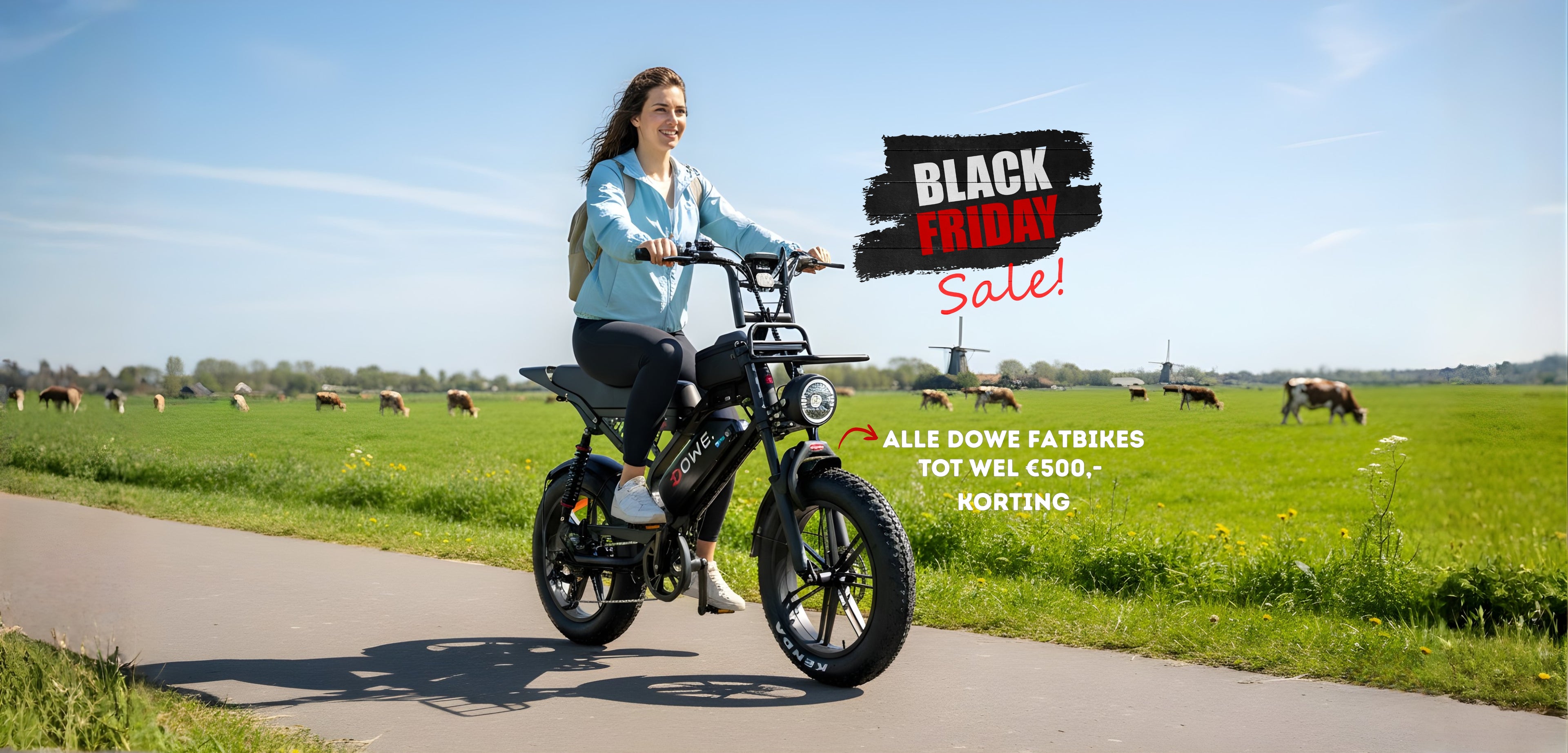 Woman riding a electric fatbike on a road with a Black Friday sale banner in the background.